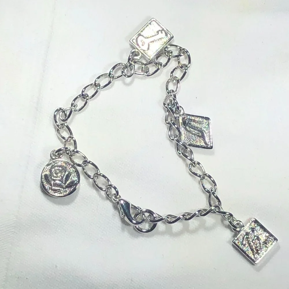 SILVER TONE BARBIE CHARM BRACELET